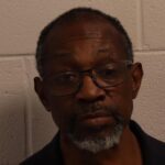 Felon convicted of possessing firearm and controlled substances