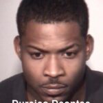 Individual identified, charged in shooting at Bowling and Family Fun Center; remains at large